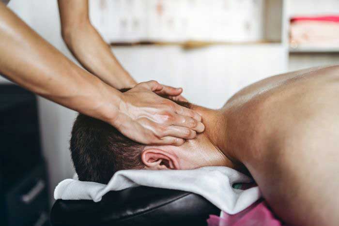 Man receiving massage therapy